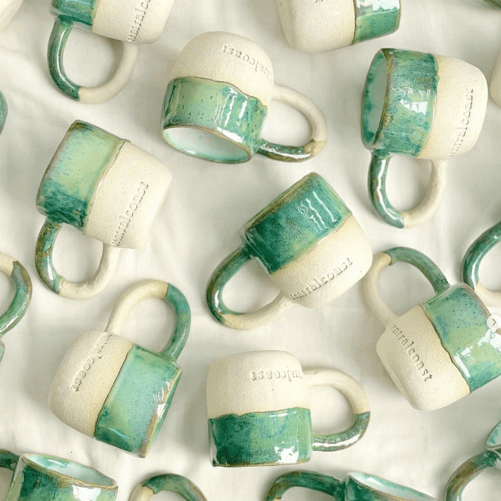 handmade ceramic mugs with Central Coast stamped on them 