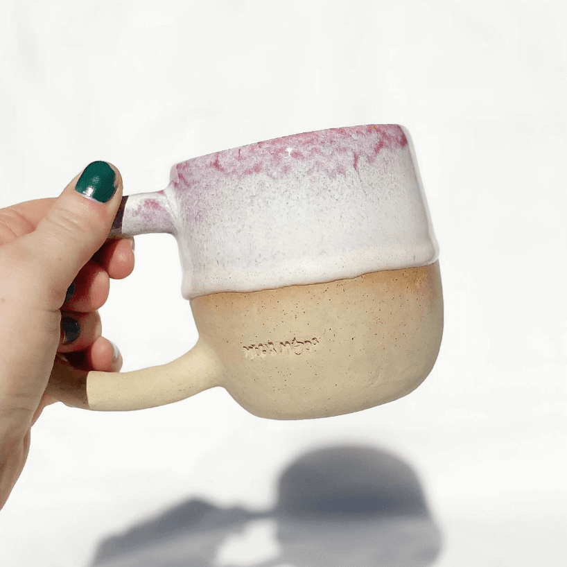Hand made mug with pink and white glaze