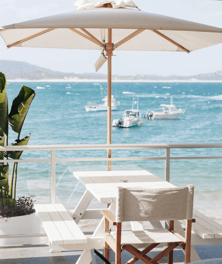 table and overlooking ocean