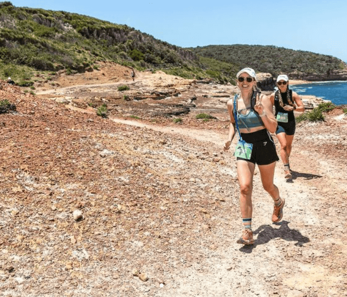 Runners on costal terrain