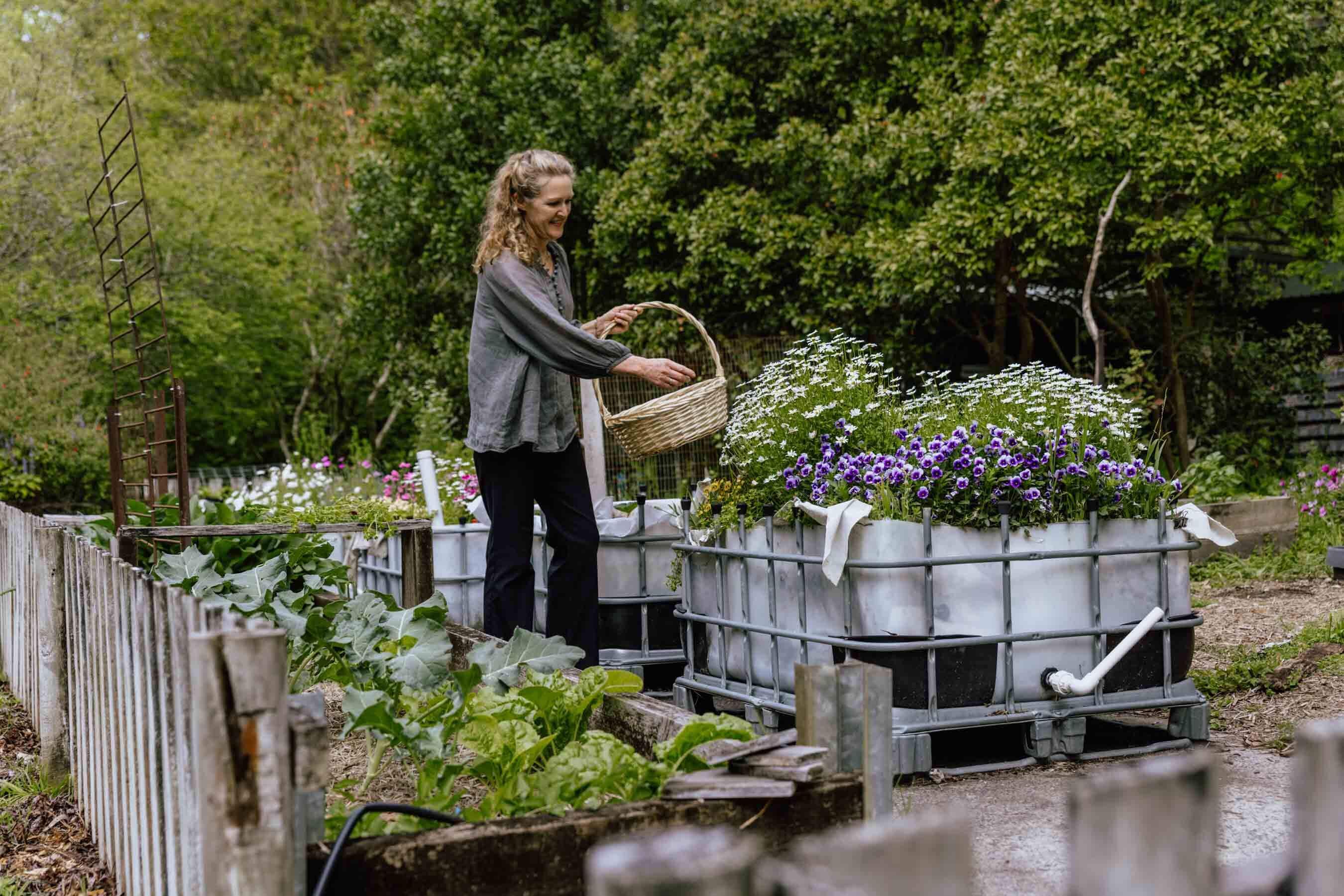 winemaker tending to organic outdoor onsite garden