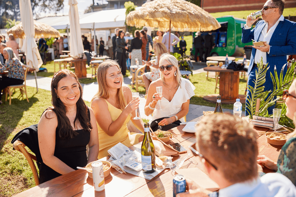 The Entertainment Grounds image FB people enjoying food and wine outdoors