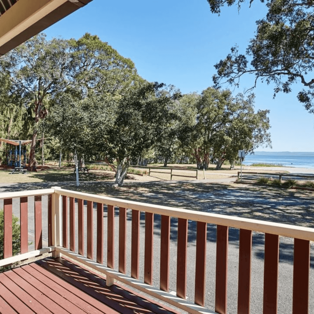 Point of view shot from a holiday cabin with a lake view