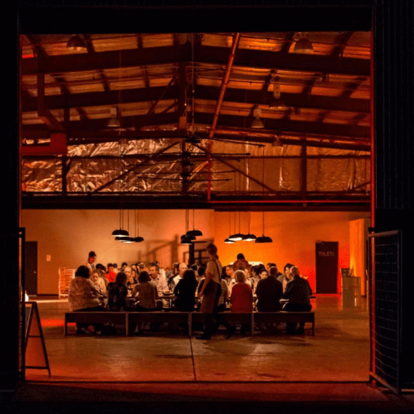 Communal dining in warehouse