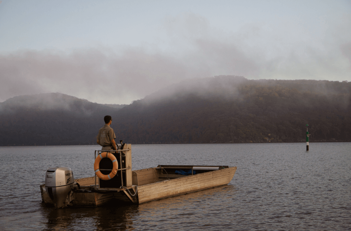 old oyster boat surrounded by mist