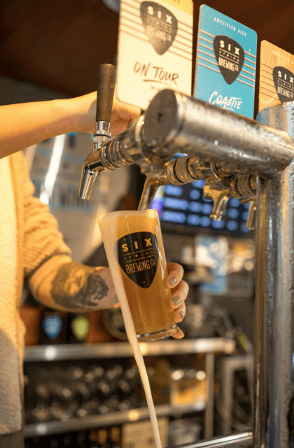 Close up of pint of beer being pulled