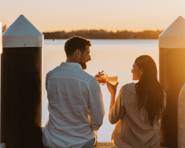 Couple at the Beachcomber resort at sunset by Remy Brand x Destination Central Coast