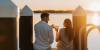 Couple at the Beachcomber resort at sunset by Remy Brand x Destination Central Coast